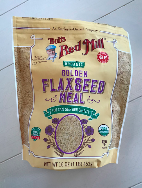 Flax seed meal in a bag on the table