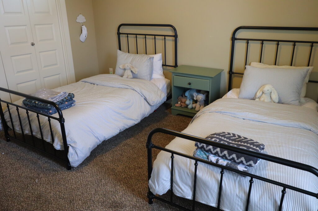 Doubled Beds With Striped Duvet Covers