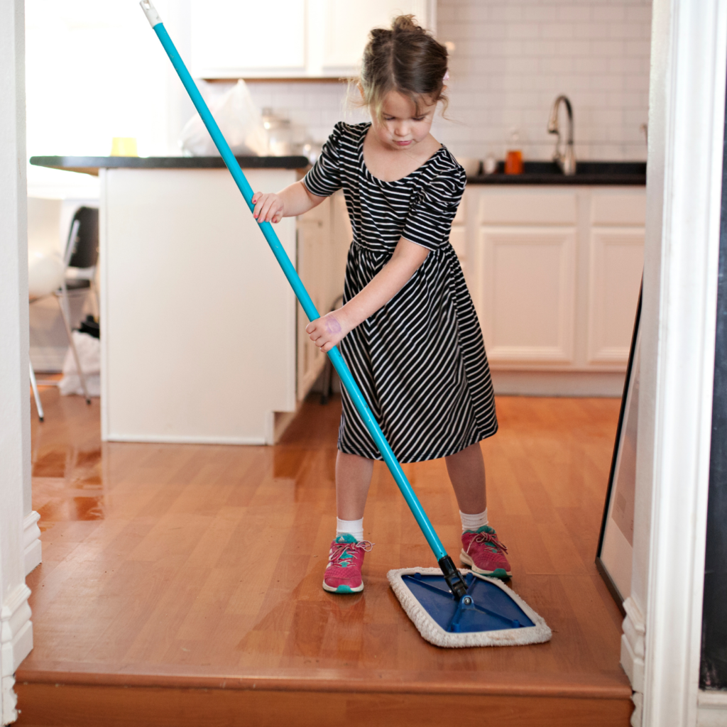 Kid helping cleaning